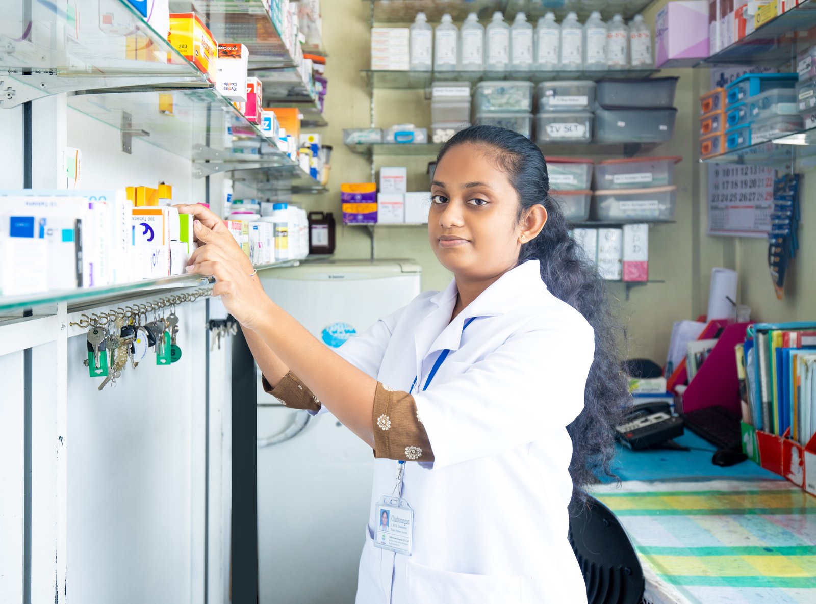 Pharmacist working in a modern pharmacy setting
