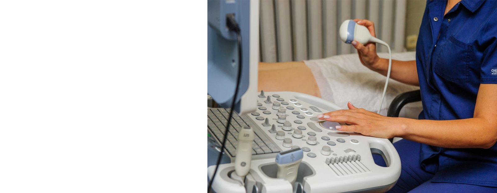 Doctor performing an ultrasound scan on a patient